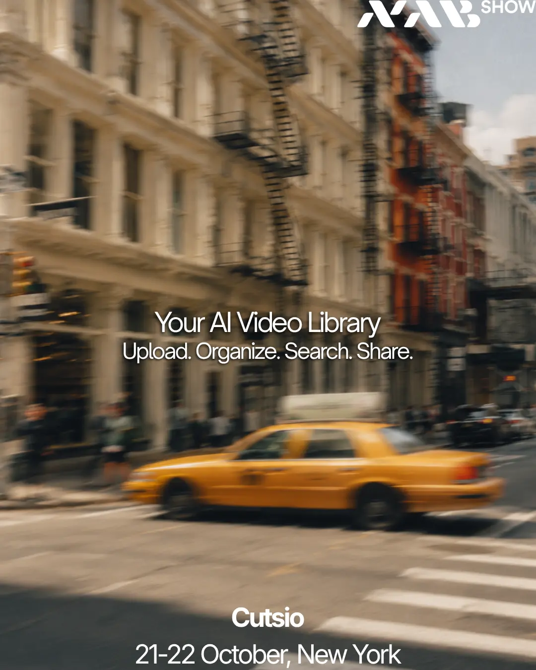 A yellow New York taxi moving through the city